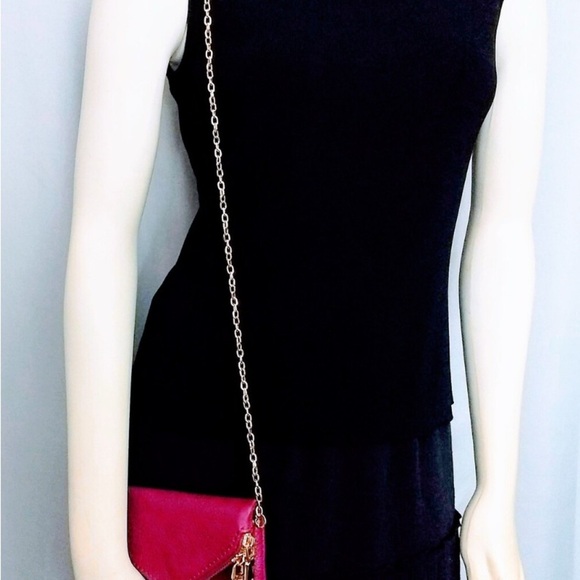 Burgundy Urban Expression Crossbody Vegan leather clutch purse gold detail. - Picture 6 of 10